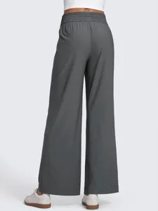 Back view detail of women high waist dark gray wide leg casual pants with elastic waistband.