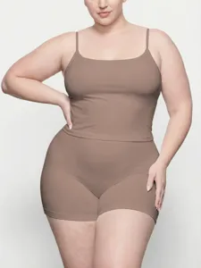 Plus size loungewear camisole and shorts set, comfortable stretch modal fabric detail view.