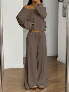 Stylish off-the-shoulder long sleeve top and wide leg pants set, perfect casual wear for women.