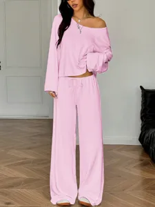 Pink off-shoulder long sleeve top and wide-leg pants loungewear set, casual and comfortable.
