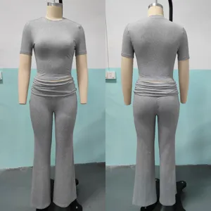 Grey solid color short sleeve crop top and high waist flared pants two piece set for women casual wear