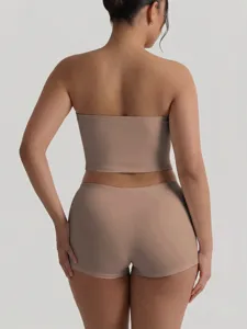 Back view detail of women seamless nude crop tube top and matching shorts summer outfit.