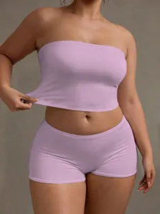 Detailed view of a light purple strapless crop top and matching shorts set, slim fit style.