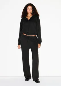 Women full-zip hoodie and sweatpants tracksuit set detail view, comfortable leisure wear.