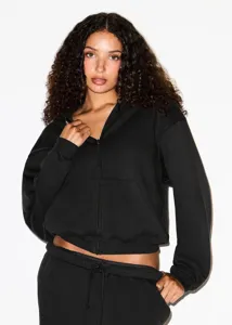 Women's black zip-up hoodie and sweatpants casual tracksuit set for daily wear and sports.