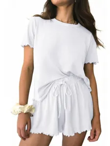Close up view of women ribbed knit pajama set short sleeve and drawstring shorts detail