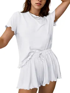 Detail view of the white ribbed knit short sleeve top and drawstring shorts set for women.