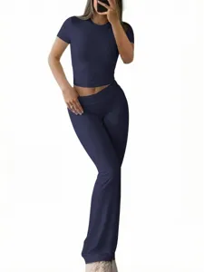 Casual solid color slim fit short sleeve top and long pants two piece set detail.