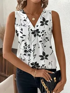Witte dames mouwloze top met V-hals en zwarte bladeren print, stijlvol en mooi.