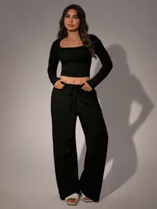 Women black square neck long sleeve crop top and loose drawstring trousers casual set outfit.