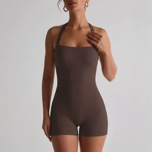 Brown ribbed halter neck one-piece romper jumpsuit for women, stylish summer casual wear.