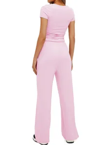 Ensemble haut manches courtes et pantalon large taille haute rose vetement style detail