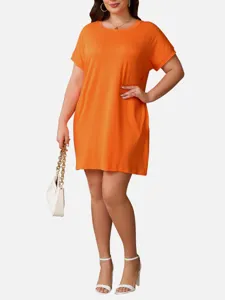 Vestido holgado grande de manga corta cuello redondo naranja vista de detalle ajuste.