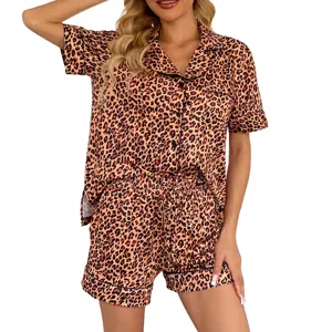 Close-up detail of the women's leopard print satin short sleeve pajama set fabric.