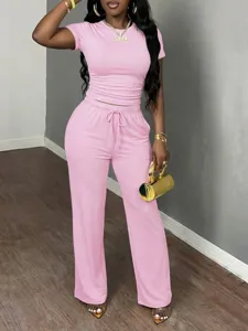 Pink two-piece set short sleeve crop top and wide leg trousers Y2K fashion casual outfit.