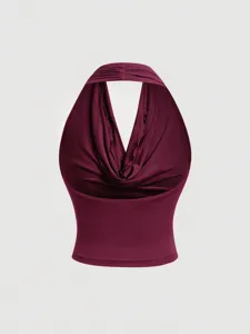 Detailed view of the burgundy halter top featuring a stylish cowl neck and elegant draping.
