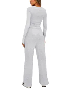 Ensemble haut à manches longues et pantalon large taille haute uni détail.