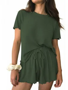 Ribbed knit short sleeve top and drawstring shorts lounge set in deep green, casual detail.