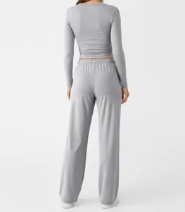 Detailed back view of casual grey lounge set, featuring long sleeve top and wide leg pants.