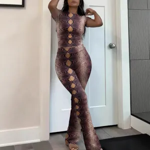 Women snake print two piece outfit short sleeve crop top and flare pants Y2K casual set