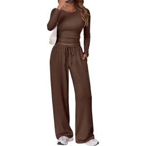 Women solid color long sleeve crop top and loose sweatpants casual two piece loungewear set.