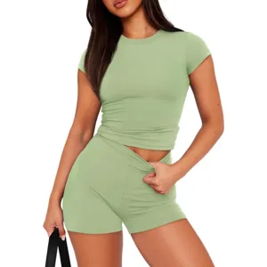 Detail view of casual women solid color short sleeve top and shorts lounge matching set.