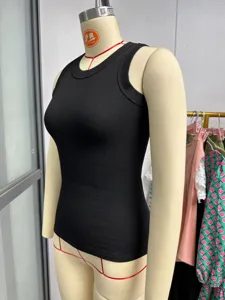Detail view of women's black ribbed tank top, casual sleeveless scoop neck layering top.
