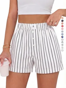 Detail view of women's casual striped high-waist boxer shorts, loose fit and comfortable.