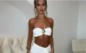 White strapless bandeau crop top and skirt two piece set with metallic shell detail.