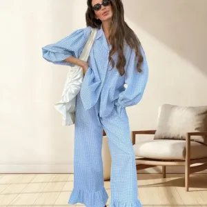 Detailed view of blue and white gingham loungewear set, featuring puff sleeves and comfy pants.