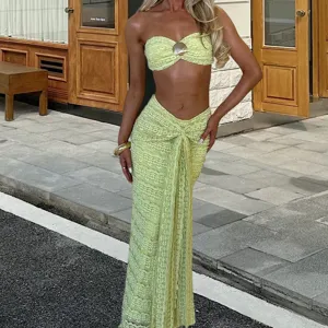 Lime green two-piece set, strapless crop top with shell accent and wrap maxi skirt.