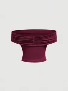 Burgundy off-the-shoulder top fabric detail showing the elegant draped neckline design.
