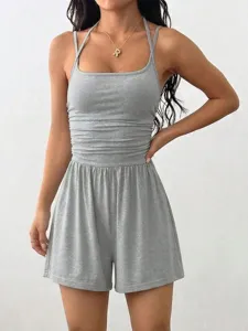 Detailed view of the casual grey spaghetti strap romper, showing soft fabric and relaxed fit.