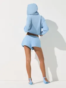 Light blue cropped hoodie and shorts set, stylish casual athletic two-piece outfit for women.