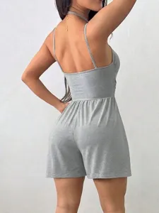 Back view detail of a casual gray spaghetti strap romper shorts, featuring a sleeveless design.