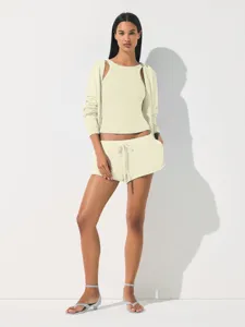 Casual three-piece lounge set featuring a zip hoodie, tank top, and drawstring shorts.