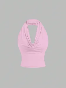 Detailed view of the elegant pink cowl neck halter top, featuring a stylish draped neckline.