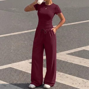 Women maroon casual t-shirt and wide leg pants set outdoor street wear stylish outfit.