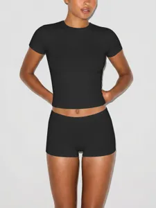 Detailed close-up view of the black casual stretch short sleeve crop top and shorts.
