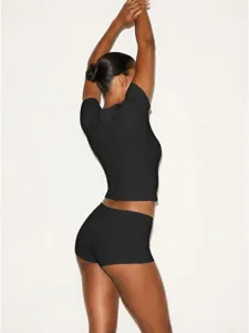 Women black slim fit stretch short sleeve t-shirt and matching shorts set casual outfit.