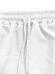 White casual pants detail, elastic drawstring waistband, comfortable minimalist summer design.
