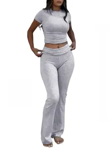 Close-up detail of women's ribbed two-piece crop top and flared pants casual outfit grey.