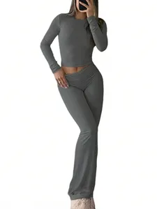 Detail view of the dark grey two-piece casual workout set featuring a long-sleeve crop top.