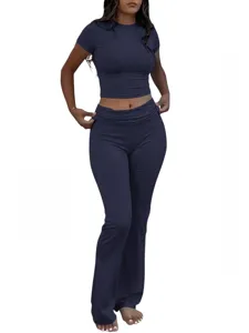 Women's two-piece workout set featuring a crop top and low-waist flare pants for casual wear.
