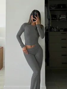 Women grey two piece set long sleeve crewneck crop top and low rise flared pants casual outfit