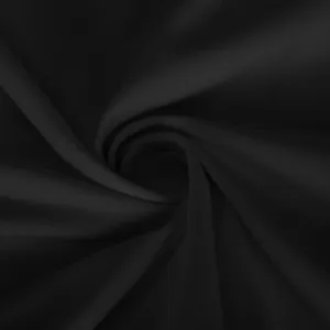 Black athletic fabric material detail texture close up view for sportswear and fitness apparel.