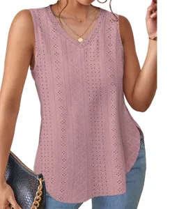 Close-up detail of the pink v-neck sleeveless eyelet top featuring delicate hollow-out lace.