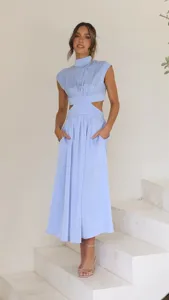 Light blue mock neck waist cut-out midi dress with pleated skirt and handy side pockets.