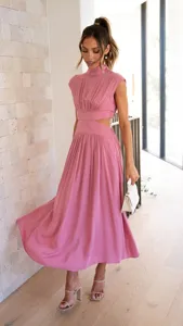 Pink high-neck sleeveless midi dress featuring stylish cut-out waist and flared hem for summer.
