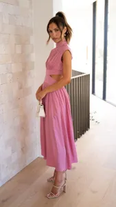 Detail view of stylish pink sleeveless high-neck cut-out midi dress for women summer wear.
